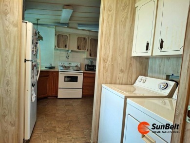 Handyman Special! 2BR/2BA | Spacious Fixer-Upper in Rolling on Rolling Greens Executive Golf Community in Florida - for sale on GolfHomes.com, golf home, golf lot