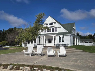 Experience elegance and functionality in this stunning on Charlevoix Golf and Country Club in Michigan - for sale on GolfHomes.com, golf home, golf lot