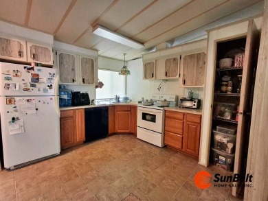 Handyman Special! 2BR/2BA | Spacious Fixer-Upper in Rolling on Rolling Greens Executive Golf Community in Florida - for sale on GolfHomes.com, golf home, golf lot