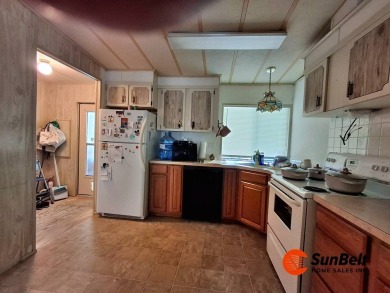 Handyman Special! 2BR/2BA | Spacious Fixer-Upper in Rolling on Rolling Greens Executive Golf Community in Florida - for sale on GolfHomes.com, golf home, golf lot