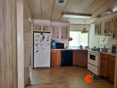 Handyman Special! 2BR/2BA | Spacious Fixer-Upper in Rolling on Rolling Greens Executive Golf Community in Florida - for sale on GolfHomes.com, golf home, golf lot