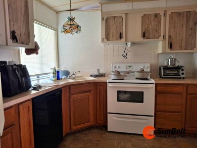 Handyman Special! 2BR/2BA | Spacious Fixer-Upper in Rolling on Rolling Greens Executive Golf Community in Florida - for sale on GolfHomes.com, golf home, golf lot