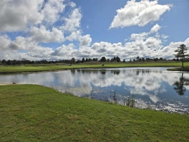 Experience elegance and functionality in this stunning on Charlevoix Golf and Country Club in Michigan - for sale on GolfHomes.com, golf home, golf lot