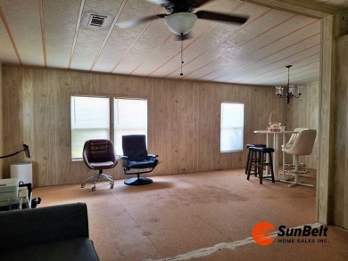 Handyman Special! 2BR/2BA | Spacious Fixer-Upper in Rolling on Rolling Greens Executive Golf Community in Florida - for sale on GolfHomes.com, golf home, golf lot