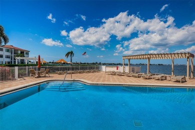 Relaxation in Paradise. The first thing to appreciate when on Isla Del Sol Yacht and Country Club in Florida - for sale on GolfHomes.com, golf home, golf lot