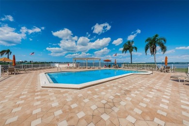 Relaxation in Paradise. The first thing to appreciate when on Isla Del Sol Yacht and Country Club in Florida - for sale on GolfHomes.com, golf home, golf lot