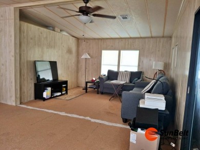 Handyman Special! 2BR/2BA | Spacious Fixer-Upper in Rolling on Rolling Greens Executive Golf Community in Florida - for sale on GolfHomes.com, golf home, golf lot