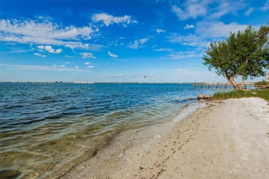 Relaxation in Paradise. The first thing to appreciate when on Isla Del Sol Yacht and Country Club in Florida - for sale on GolfHomes.com, golf home, golf lot