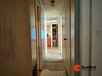 Handyman Special! 2BR/2BA | Spacious Fixer-Upper in Rolling on Rolling Greens Executive Golf Community in Florida - for sale on GolfHomes.com, golf home, golf lot