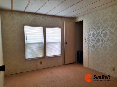 Handyman Special! 2BR/2BA | Spacious Fixer-Upper in Rolling on Rolling Greens Executive Golf Community in Florida - for sale on GolfHomes.com, golf home, golf lot