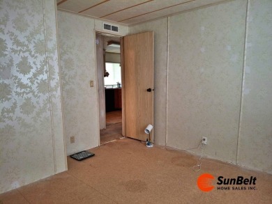 Handyman Special! 2BR/2BA | Spacious Fixer-Upper in Rolling on Rolling Greens Executive Golf Community in Florida - for sale on GolfHomes.com, golf home, golf lot