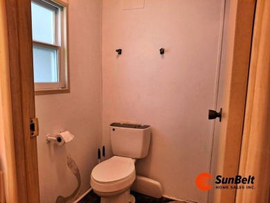 Handyman Special! 2BR/2BA | Spacious Fixer-Upper in Rolling on Rolling Greens Executive Golf Community in Florida - for sale on GolfHomes.com, golf home, golf lot
