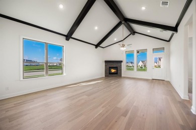 This highly sought-after single-story Altura Aspen floorplan is on Heath Golf and Yacht Club in Texas - for sale on GolfHomes.com, golf home, golf lot
