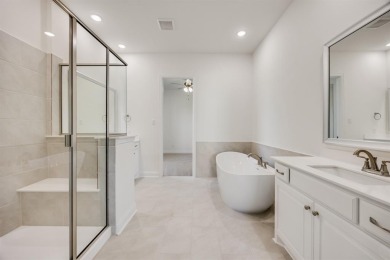 This highly sought-after single-story Altura Aspen floorplan is on Heath Golf and Yacht Club in Texas - for sale on GolfHomes.com, golf home, golf lot
