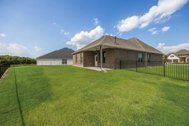 This highly sought-after single-story Altura Aspen floorplan is on Heath Golf and Yacht Club in Texas - for sale on GolfHomes.com, golf home, golf lot