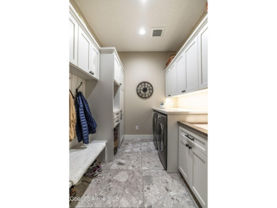 Discover serene lakeside living in this stunning 2021-built on Stoneridge Golf Club in Idaho - for sale on GolfHomes.com, golf home, golf lot