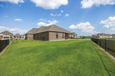 This highly sought-after single-story Altura Aspen floorplan is on Heath Golf and Yacht Club in Texas - for sale on GolfHomes.com, golf home, golf lot