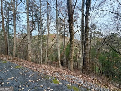 Discover the perfect canvas for your dream home on this gently on Kingwood Golf Club and Resort in Georgia - for sale on GolfHomes.com, golf home, golf lot