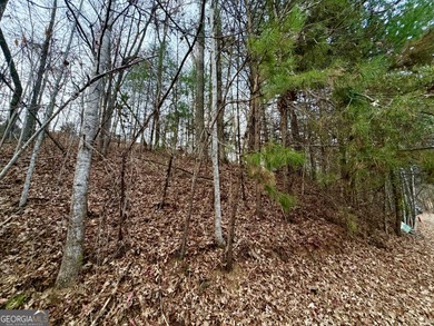 Discover the perfect canvas for your dream home on this gently on Kingwood Golf Club and Resort in Georgia - for sale on GolfHomes.com, golf home, golf lot