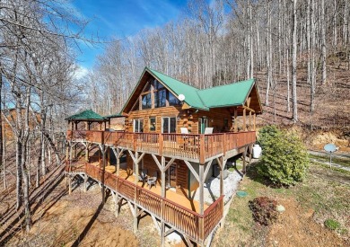 Charming Log Cabin Retreat in Bryson City -Nestled in the heart on Smoky Mountain Country Club in North Carolina - for sale on GolfHomes.com, golf home, golf lot