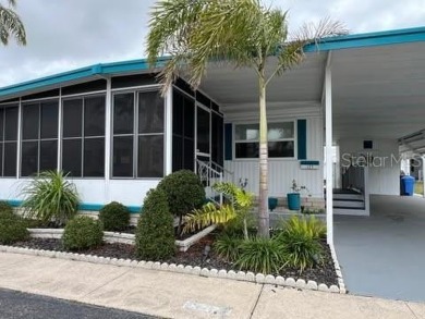 DOUBLE WIDE WITH 2 BEDROOMS AND 2 BATHROOMS. This 1608 sqft home on Mainlands Golf Club in Florida - for sale on GolfHomes.com, golf home, golf lot