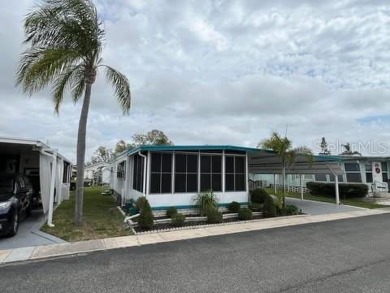 DOUBLE WIDE WITH 2 BEDROOMS AND 2 BATHROOMS. This 1608 sqft home on Mainlands Golf Club in Florida - for sale on GolfHomes.com, golf home, golf lot