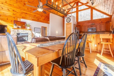 Charming Log Cabin Retreat in Bryson City -Nestled in the heart on Smoky Mountain Country Club in North Carolina - for sale on GolfHomes.com, golf home, golf lot