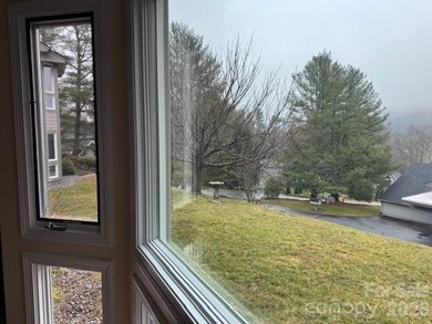 Discover refined mountain living in this beautiful 2BR/2BA on Kenmure Country Club in North Carolina - for sale on GolfHomes.com, golf home, golf lot