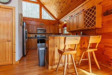 Charming Log Cabin Retreat in Bryson City -Nestled in the heart on Smoky Mountain Country Club in North Carolina - for sale on GolfHomes.com, golf home, golf lot