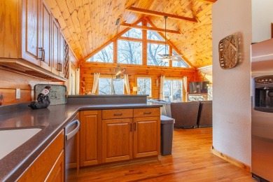 Charming Log Cabin Retreat in Bryson City -Nestled in the heart on Smoky Mountain Country Club in North Carolina - for sale on GolfHomes.com, golf home, golf lot