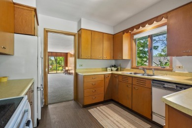 Mid Century sprawling home offers so many spaces to entertain on Urbana Golf and Country Club in Illinois - for sale on GolfHomes.com, golf home, golf lot