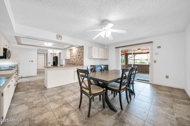 This unique 3 bedroom, 3 bath North/South facing home in Sun on Union Hills Country Club in Arizona - for sale on GolfHomes.com, golf home, golf lot