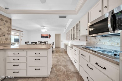 This unique 3 bedroom, 3 bath North/South facing home in Sun on Union Hills Country Club in Arizona - for sale on GolfHomes.com, golf home, golf lot