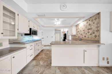 This unique 3 bedroom, 3 bath North/South facing home in Sun on Union Hills Country Club in Arizona - for sale on GolfHomes.com, golf home, golf lot