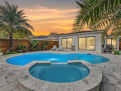 Experience luxury living in this fully remodeled golf course on Hollywood Beach Golf and Country Club in Florida - for sale on GolfHomes.com, golf home, golf lot