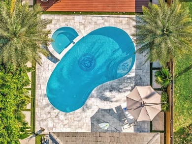 Experience luxury living in this fully remodeled golf course on Hollywood Beach Golf and Country Club in Florida - for sale on GolfHomes.com, golf home, golf lot