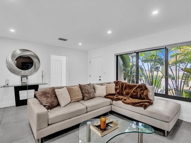 Experience luxury living in this fully remodeled golf course on Hollywood Beach Golf and Country Club in Florida - for sale on GolfHomes.com, golf home, golf lot