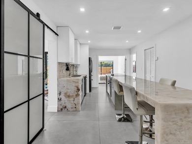 Experience luxury living in this fully remodeled golf course on Hollywood Beach Golf and Country Club in Florida - for sale on GolfHomes.com, golf home, golf lot