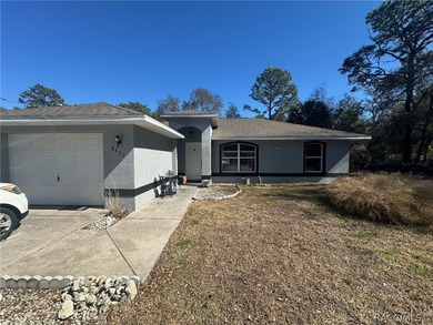 Welcome to this cute Citrus Springs home featuring a split floor on Pine Ridge Community Golf and Country Club in Florida - for sale on GolfHomes.com, golf home, golf lot