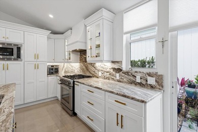 Airy, bright, open-concept 3BR/2.5BA patio home beautifully on Harbour Ridge Yacht and Country Club in Florida - for sale on GolfHomes.com, golf home, golf lot