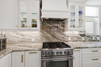 Airy, bright, open-concept 3BR/2.5BA patio home beautifully on Harbour Ridge Yacht and Country Club in Florida - for sale on GolfHomes.com, golf home, golf lot