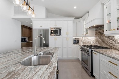 Airy, bright, open-concept 3BR/2.5BA patio home beautifully on Harbour Ridge Yacht and Country Club in Florida - for sale on GolfHomes.com, golf home, golf lot