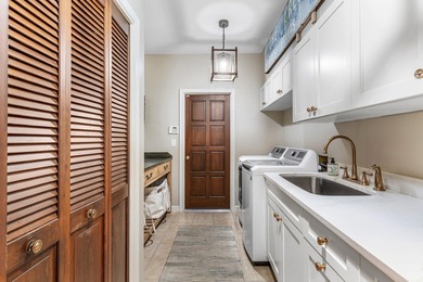 Stunning complete renovation in the highly desirable, gated City on Atlantis Golf Club in Florida - for sale on GolfHomes.com, golf home, golf lot