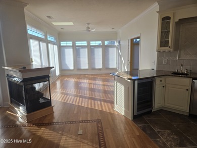 This elegant ranch-style residence offers panoramic views of on Ocean Ridge Plantation in North Carolina - for sale on GolfHomes.com, golf home, golf lot