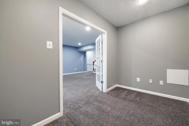 This Generous Town Home boasts over 3300 square feet of living on Lake Presidential Golf Club in Maryland - for sale on GolfHomes.com, golf home, golf lot