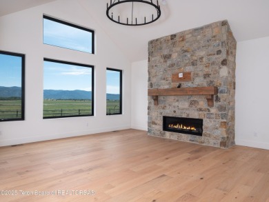 This brand-new custom home in Teton Reserve feels like a private on Teton Reserve in Idaho - for sale on GolfHomes.com, golf home, golf lot
