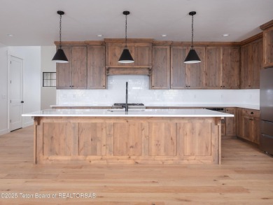 This brand-new custom home in Teton Reserve feels like a private on Teton Reserve in Idaho - for sale on GolfHomes.com, golf home, golf lot