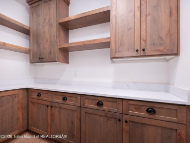 This brand-new custom home in Teton Reserve feels like a private on Teton Reserve in Idaho - for sale on GolfHomes.com, golf home, golf lot