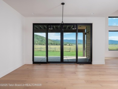 This brand-new custom home in Teton Reserve feels like a private on Teton Reserve in Idaho - for sale on GolfHomes.com, golf home, golf lot