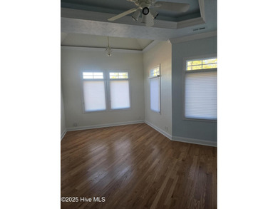 This elegant ranch-style residence offers panoramic views of on Ocean Ridge Plantation in North Carolina - for sale on GolfHomes.com, golf home, golf lot